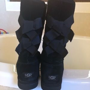Tall Ugg boots black with bows in back